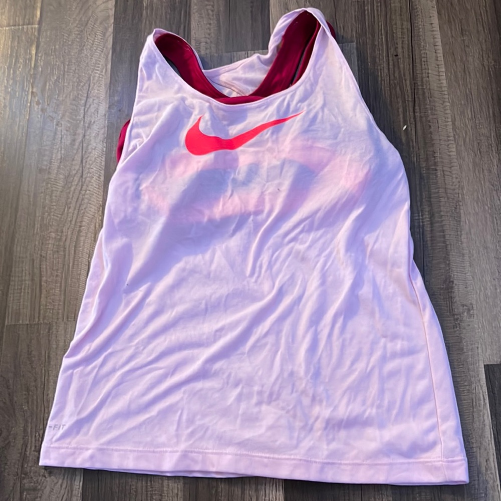 light pink nike workout top with sports bra built in